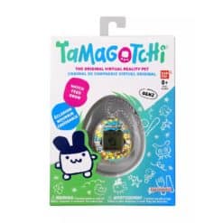 Tamagotchi-virtuaalilemmikkilelu, joka on koristeltu sarjakuvatyylisellä kuviolla
